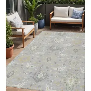 Photo of Gray Ivory And Gold Damask Washable Indoor Outdoor Area Rug