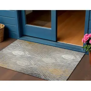Photo of Gray Ivory And Gold Floral Washable Indoor Outdoor Area Rug
