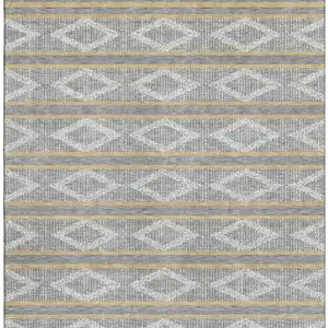 Photo of Gray Ivory And Gold Geometric Washable Area Rug With UV Protection