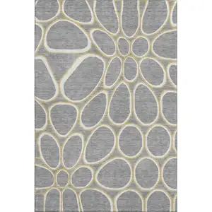 Photo of Gray Ivory And Gold Geometric Washable Area Rug With UV Protection