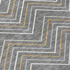 Photo of Gray Ivory And Gold Geometric Washable Indoor Outdoor Area Rug