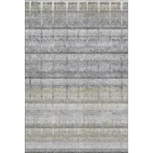 Photo of Gray Ivory And Gold Striped Washable Area Rug With UV Protection
