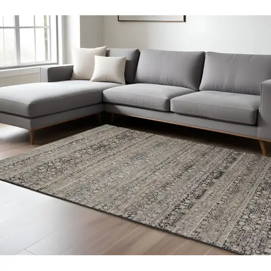Gray Ivory And Tan Abstract Distressed Area Rug With Fringe Photo 1