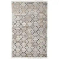 Photo of Gray Ivory And Tan Geometric Hand Woven Stain Resistant Area Rug With Fringe