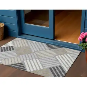 Photo of Gray Ivory And Tan Geometric Washable Indoor Outdoor Area Rug