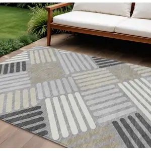 Photo of Gray Ivory And Tan Geometric Washable Indoor Outdoor Area Rug