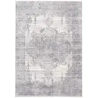 Photo of Gray Ivory And Taupe Abstract Distressed Area Rug With Fringe