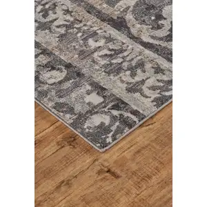 Photo of Gray Ivory And Taupe Abstract Stain Resistant Area Rug