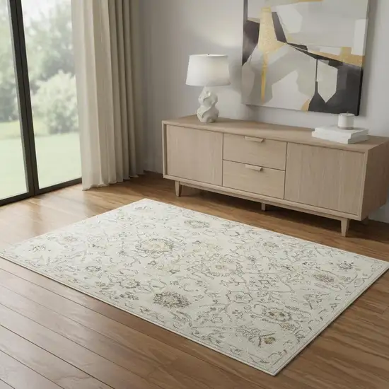 Gray Ivory And Yellow Floral Distressed Area Rug Photo 1