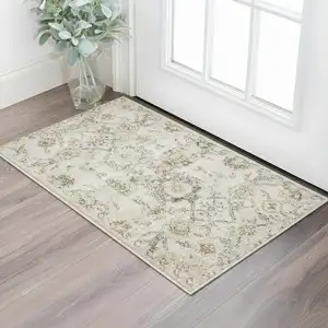 Photo of Gray Ivory And Yellow Floral Distressed Area Rug