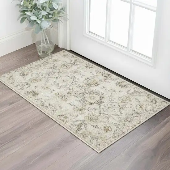Gray Ivory And Yellow Floral Distressed Area Rug Photo 1