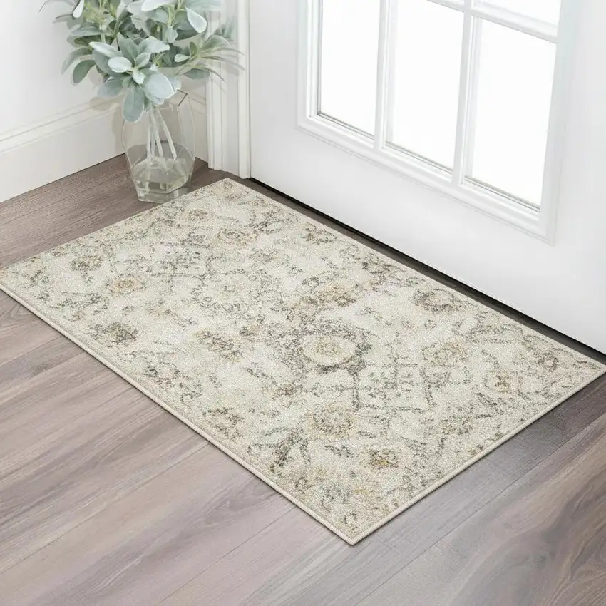 Gray Ivory And Yellow Floral Distressed Area Rug Photo 1