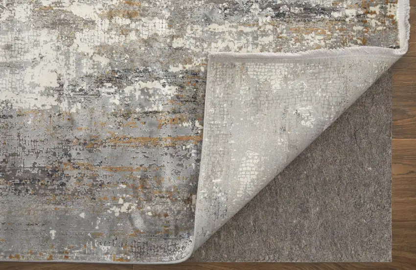 Gray Ivory and Gold Abstract Power Loom Area Rug With Fringe Photo 8