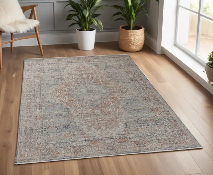 Gray Ivory and Orange Oriental Power Loom Worn Faded Area Rug With Fringe Photo 1
