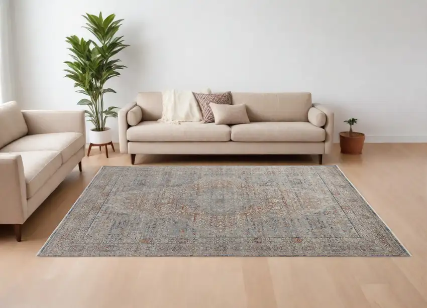 Gray Ivory and Orange Oriental Power Loom Worn Faded Area Rug With Fringe Photo 1