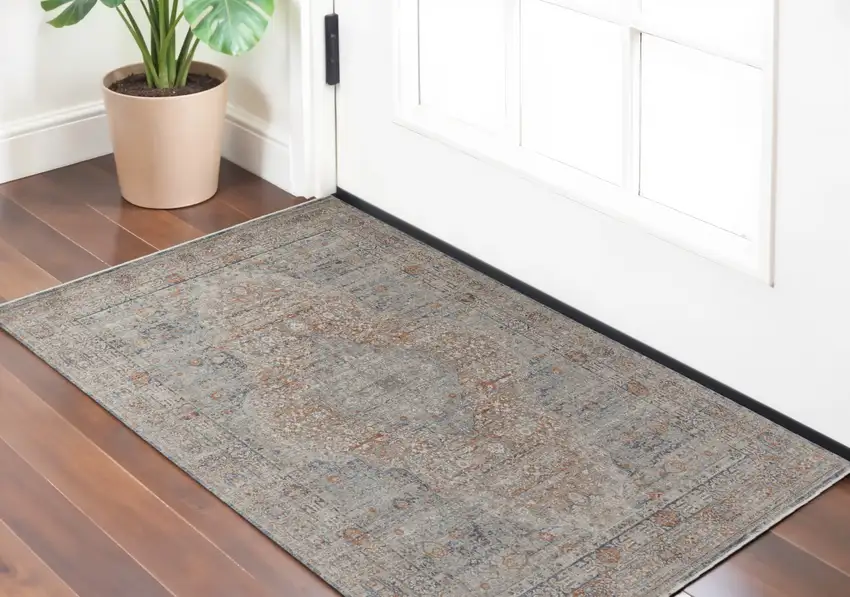 Gray Ivory and Orange Oriental Power Loom Worn Faded Area Rug With Fringe Photo 1