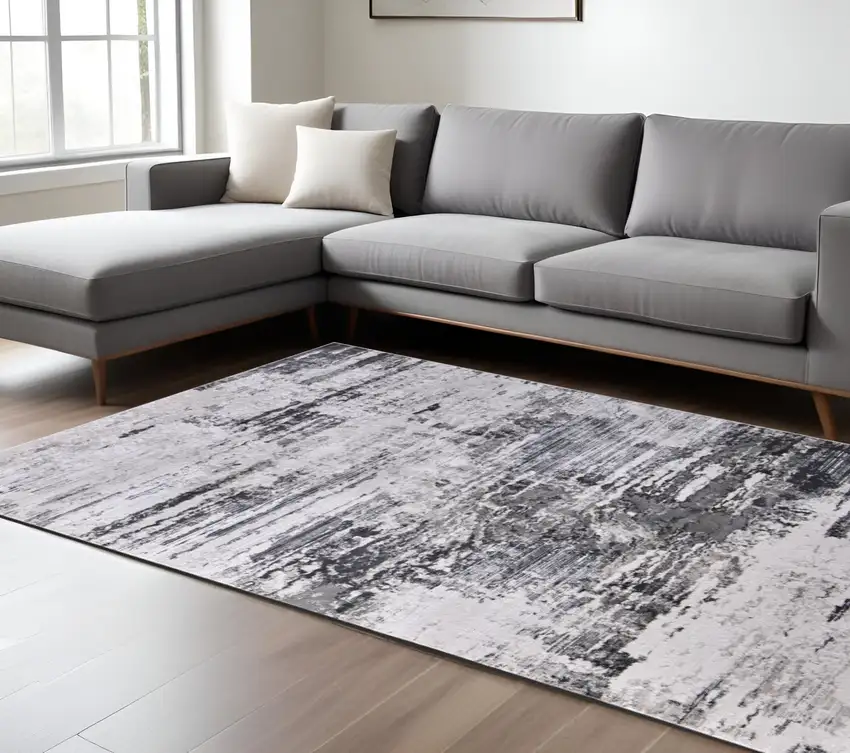 Gray Ivory and Taupe Abstract Power Loom Worn Faded Area Rug Photo 1