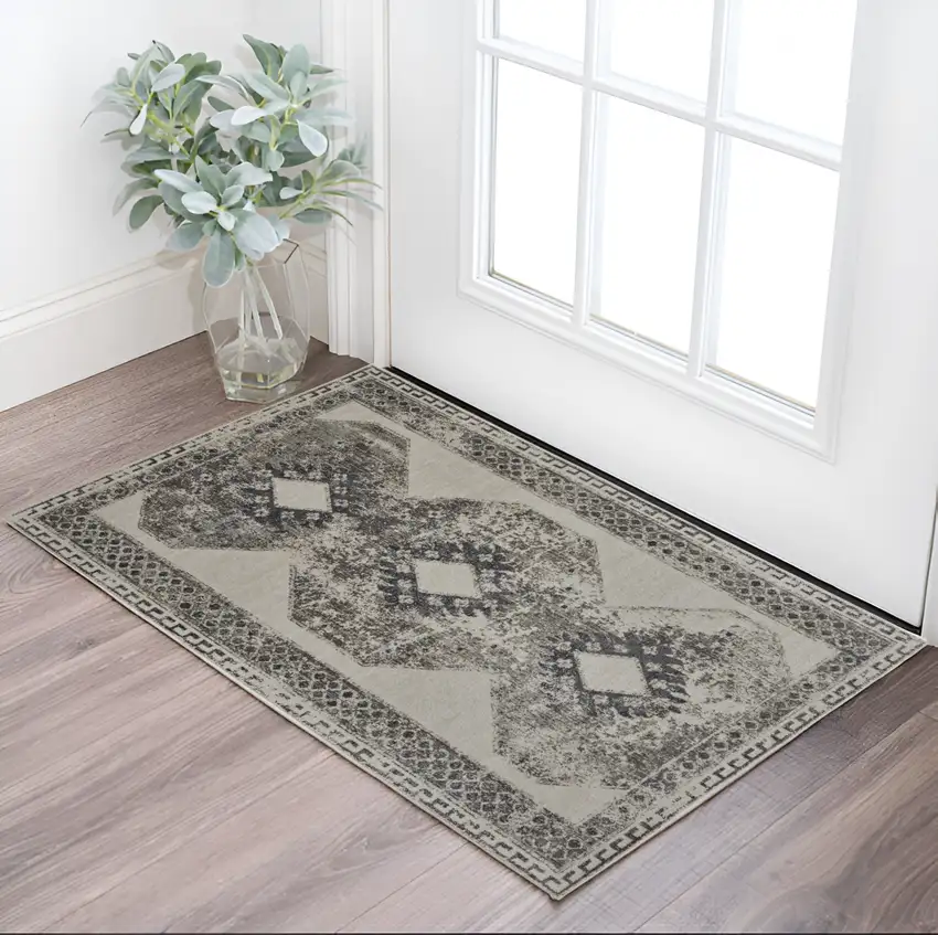 Gray Ivory and Taupe Abstract Power Loom Worn Faded Area Rug Photo 1