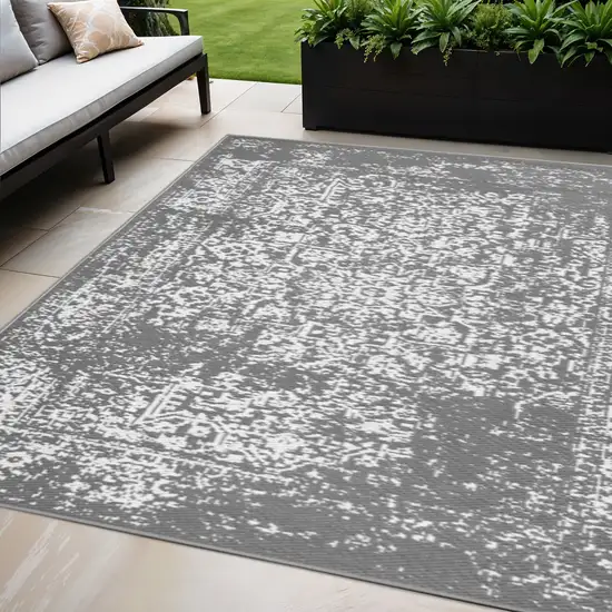 Gray Machine Braided Distressed Area Rug With UV Protection Photo 1