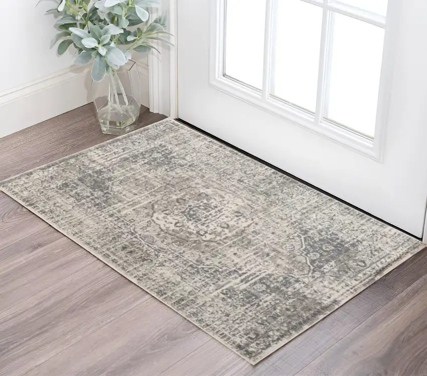 Medium Gray and Ivory Medallion Power Loom Area Rug Photo 1