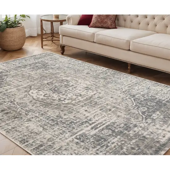 Medium Gray and Ivory Medallion Power Loom Area Rug Photo 1