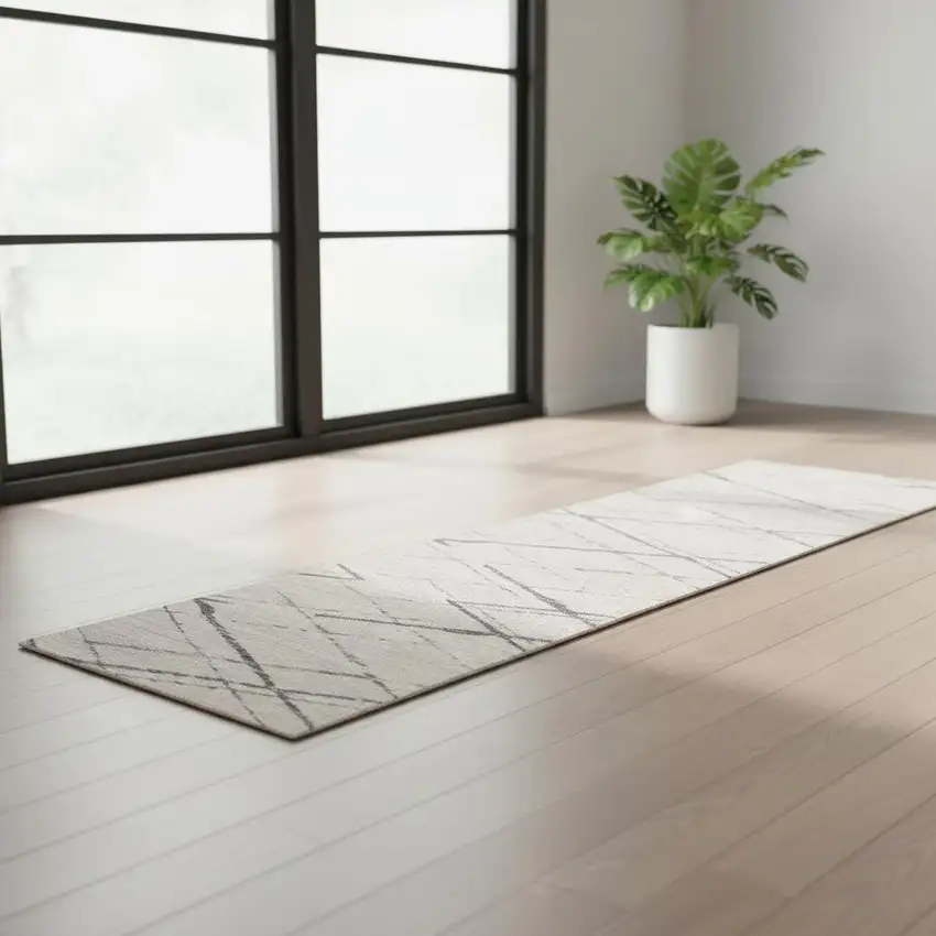 6' Gray And Ivory Geometric Runner Rug Photo 1