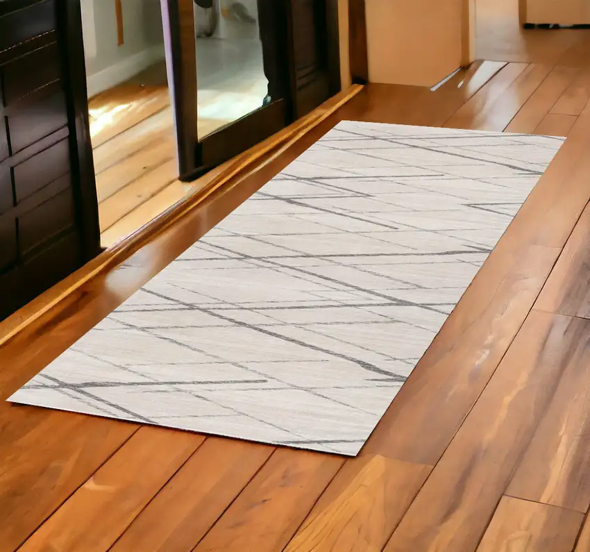 2' X 6' Gray Geometric Dhurrie Area Rug Photo 1
