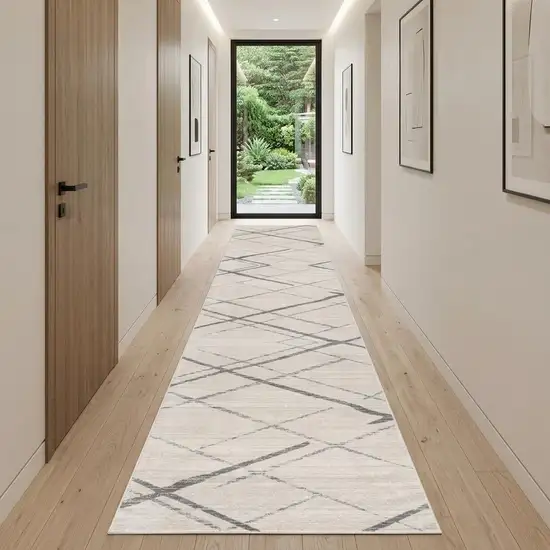 10' Gray And Ivory Geometric Runner Rug Photo 1