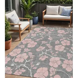 Photo of Gray Pink And Ivory Floral Washable Indoor Outdoor Area Rug
