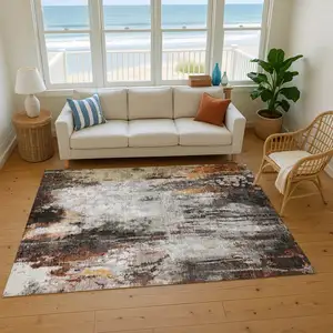Photo of Gray Rust And Ivory Abstract Washable Area Rug With UV Protection