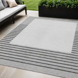 Photo of Gray Silver And Black Striped Washable Indoor Outdoor Area Rug