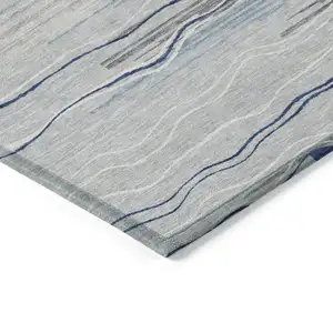 Photo of Gray Silver And Blue Striped Washable Indoor Outdoor Area Rug