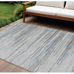 Photo of Gray Silver And Blue Striped Washable Indoor Outdoor Area Rug