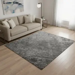 Photo of Gray Silver And Charcoal Abstract Washable Area Rug With UV Protection