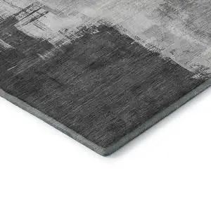 Photo of Gray Silver And Charcoal Abstract Washable Area Rug With UV Protection