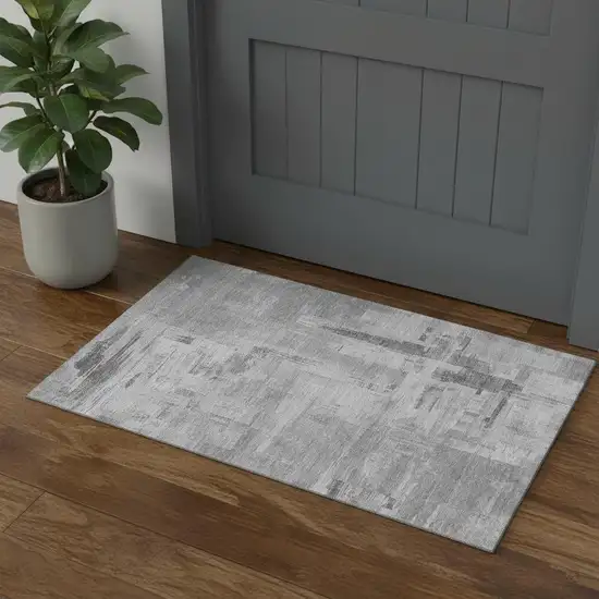 Gray Silver And Charcoal Abstract Washable Area Rug With UV Protection Photo 1