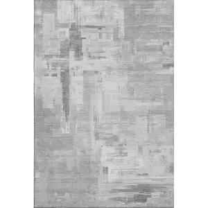 Photo of Gray Silver And Charcoal Abstract Washable Area Rug With UV Protection