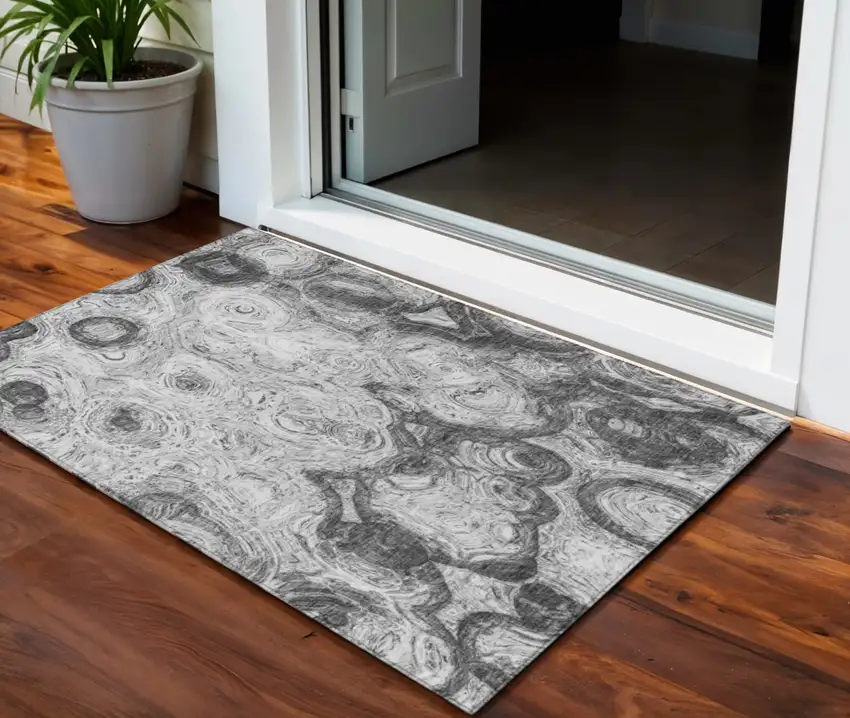 Gray Silver And Charcoal Abstract Washable Indoor Outdoor Area Rug Photo 1