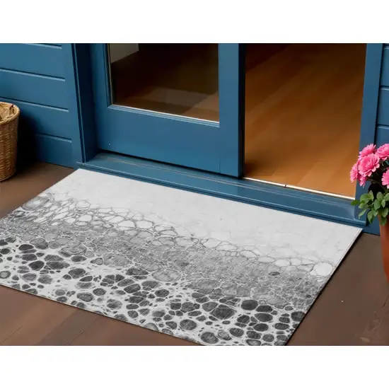 Gray Silver And Charcoal Abstract Washable Indoor Outdoor Area Rug Photo 1