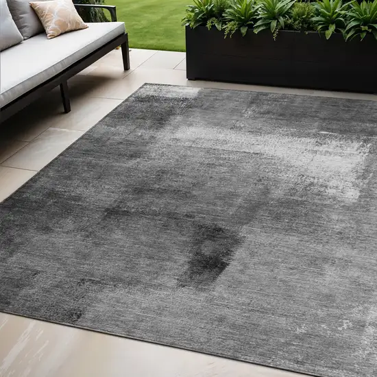 Gray Silver And Charcoal Abstract Washable Indoor Outdoor Area Rug Photo 1