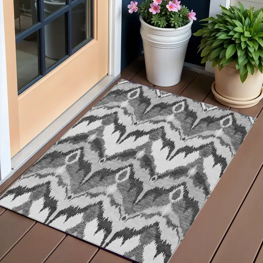 Gray Silver And Charcoal Ikat Washable Indoor Outdoor Area Rug Photo 1