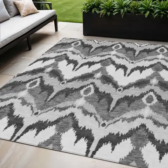 Gray Silver And Charcoal Ikat Washable Indoor Outdoor Area Rug Photo 1