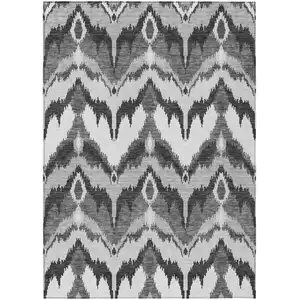 Photo of Gray Silver And Charcoal Ikat Washable Indoor Outdoor Area Rug