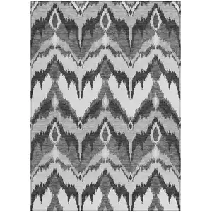 Photo of Gray Silver And Charcoal Ikat Washable Indoor Outdoor Area Rug