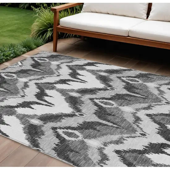 Gray Silver And Charcoal Ikat Washable Indoor Outdoor Area Rug Photo 1