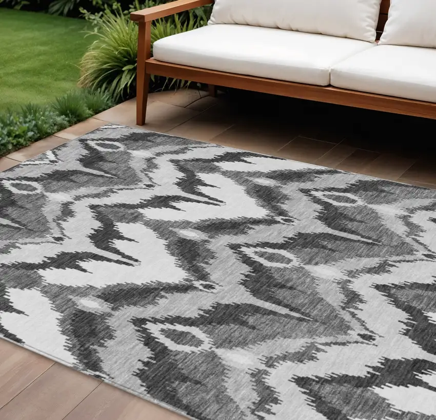 Gray Silver And Charcoal Ikat Washable Indoor Outdoor Area Rug Photo 1
