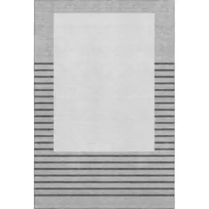 Photo of Gray Silver And Charcoal Striped Washable Area Rug With UV Protection