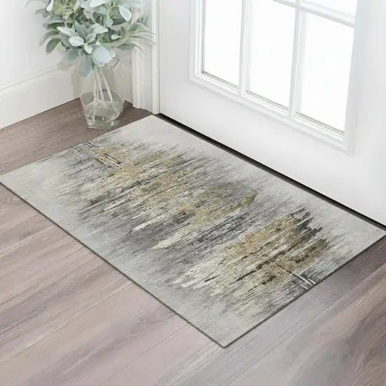 Gray Silver And Gold Abstract Washable Area Rug With UV Protection Photo 1