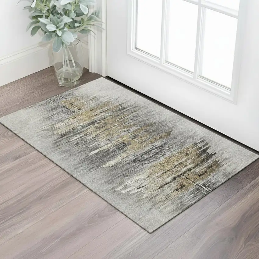 Gray Silver And Gold Abstract Washable Area Rug With UV Protection Photo 1