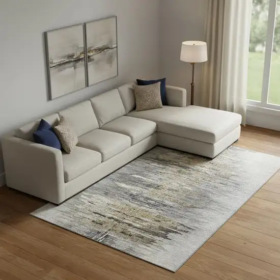 Gray Silver And Gold Abstract Washable Area Rug With UV Protection Photo 1